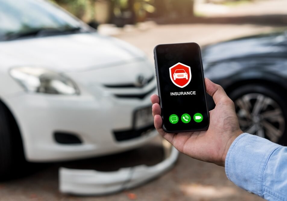 Car Insurance Concept man Using Phone To Calling Insurance Agent For